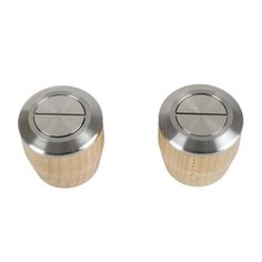 two metal knobs with wooden handles are shown on a white background and one is in the shape of a button