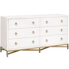 a white dresser with gold handles on it's sides and drawers, against a white background