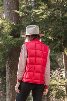 "Classic 70's Eddie Bauer down puffy vest. This beige down vest features a brass Talon zip front, pockets + ribbed knit collar. Label: Bauer Down // Blizzard Proof // Made in Seattle Condition: In good vintage condition. A couple small, light wear marks. Measurements: Seems to best fit a women's medium - large Chest (pit to pit): 44\" Overall Length: 23\" - 25\" For reference, model is 5'9\" 34/28/38 All measurements are taken flat and then doubled when appropriate. Please let me know if you hav Spring Outdoor Puffer Vest, Fitted Outdoor Puffer Vest, Fitted Puffer Vest For Outdoor, Winter Down Vest With Pockets, 70s Jacket, Pointy Collar, Picnic Dress, Puffy Vest, Faux Suede Jacket