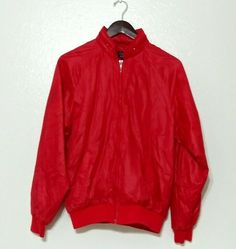 Ladies Duckster 100% Nylon Red Jacket Size Medium Zip Up Windbreaker. Pre-owned. This item had some dark marks on the left sleeve right above pocket sleeve, a dark spot on the right sleeve upper arm area, and a white mark right backside sleeve as shown in images. Has no tears. Red Nylon Track Jacket For Streetwear, Red Nylon Hooded Track Jacket, Red Nylon Windbreaker For Streetwear, Red Nylon Streetwear Windbreaker, Red Long Sleeve Nylon Windbreaker, Red Zip Up Jacket, Zip Up Windbreaker, Dark Mark, White Mark