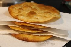 three crackers sitting on top of white napkins