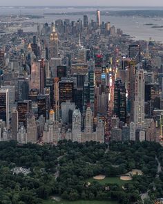 an aerial view of new york city at dusk