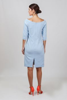 "An elegant sheath dress featuring boat neckline, midi length, and fitted silhouette. - boat neckline - wiggle pencil silhouette - knee length (midi) - 3/4 sleeves with cuffs - back slit - fully lined Concealed back zipper closure Fiber: 60% viscose, 35% polyamid, 5% elastane Lining: 57% viscose, 35% polyamid, 8% elastane Color: Light blue (white lining) For size S: length- 39,76\" (101 cm) Our model wears size S (US 8) and is 171cm/5'6\" tall. Perfect as cocktail dress, Bridesmaid dress, mother Boat Neck Dresses, Midi Wedding Guest Dress, Uniform Dress, Boat Neck Dress, Bride Groom Dress, Cheongsam Dress, Dress Bridesmaid, Chinese Dress, Wiggle Dress