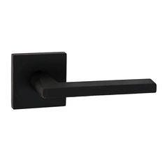 a black door handle on a white wall