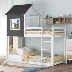 a child's bedroom with bunk beds and a play house on the wall above it