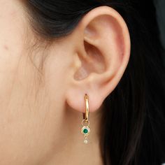 Product Details Create a delightful surprise for your beloved with these elegant Simple Hoop Drop Earrings, meant to make her feel truly cherished. These exquisite earrings showcase a Round Shape Created Emerald paired with a Diamond Drop, both delicately secured within a stylish Bezel Setting. Their convenient Hinged Hoop Back finding ensures both security and comfort. Product Information SKU SHP-EARRINGS112123709 Length 27 mm Width 5.7 mm Weight 3.69 gm (Approximate) LAB CREATED EMERALD INFORM Green 14k Gold Hoop Earrings, May Birthstone Round Hoop Earrings, May Birthstone Round Hoop Earrings For Pierced Ears, Hoop Earrings For Anniversary With May Birthstone, Anniversary Hoop Earrings With May Birthstone, Elegant Round Hoop Earrings With Emerald, Gold Hoop Earrings With Birthstone In 14k Gold, 14k Gold Birthstone Hoop Earrings, Yellow Gold Hoop Earrings With Birthstone