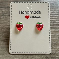 This Listing Is For A Pair Of Handmade Strawberry Earrings. Earring Stud Is 5mm And Made Out Of Stainless Steel. Hypoallergenic Earring Post And Earring Back. The Charms Are Made Out Of Resin. Super Cute For Kids Or Adults! **Comes From A Smoke Free Home** Trendy Red Earrings For Birthday, Cute Nickel-free Earrings For Mother's Day, Cute Nickel Free Earrings For Mother's Day, Cute Earrings For Mother's Day, Cute Adjustable Earrings For Mother's Day, Cute Mother's Day Earrings, Sweet Handmade Earrings For Gift, Sweet Handmade Earrings As Gift, Sweet Red Earrings For Gift