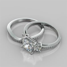 two wedding rings with diamonds on them are shown in this 3d rendering image, the ring is made up of white gold and has a princess cut diamond center stone