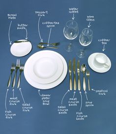 an image of a table setting with silverware and wine glasses on the table top