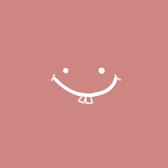 a pink background with a smiling face on the bottom right corner and two white dots in the middle