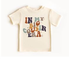 Cute and funny toddler big cousin t-shirt that makes a perfect gift for a cousin-to-be or pregnancy announcement. ♥PRODUCTION TIME: 1-5 days (Usually 2-3 days) ♥SHIPPING TIME: 2-5 days (Usually 3 days) ♥PRODUCT DESCRIPTION: Bella Canvas 3001 T-shirt Super soft cotton and excellent quality print makes. 100% Soft cotton (fiber content may vary for different colors) Light fabric (4.2 oz/yd² (142 g/m Runs true to size Our Relaxed Fit Tee (Bella Canvas 3001) is a relaxed fit and is soft and cozy. * F Big Cousin Announcement, Cousin Pregnancy Announcement, Promoted To Big Cousin, Big Cousin Shirt, Cousin Crew Shirts, Cousin Shirts, Funny Toddler, Cousin Gifts, Cousin Crew