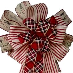 a red and white bow with words on it