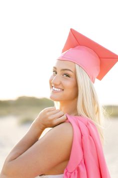 Pink Cap and Gown | Female Beach Poses | Beach Senior Session | Beach Photography Pink Cap And Gown Senior Pictures, Beach Cap And Gown Pictures, Senior Girl Cap And Gown, Pink Graduation Photoshoot, Pink Cap And Gown Graduation Pictures, Preppy Senior Pictures, Pink Cap And Gown, Girls Senior Portraits, College Graduation Photoshoot Ideas