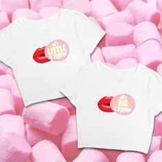 two t - shirts that say, my little poppin's and are surrounded by marshmallows