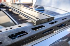 the back end of a vehicle with metal bars