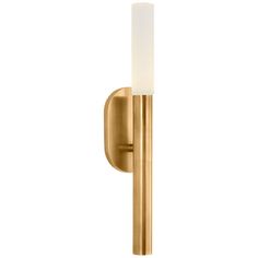 a brass wall light with a white glass shade