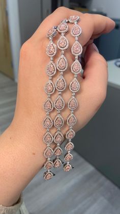 3.98 Carat total weight Natural pink pear shapes F/G color white diamonds VS-SI clarity Set in 18K White Gold 7 inches Exceptional Craftsmanship Pink Diamond Bracelet, Pear Shapes, Rare Colors, Baddie Makeup, Pear Shaped Diamond, Pink Diamond, Indian Jewellery, Vintage Diamond, White Diamonds