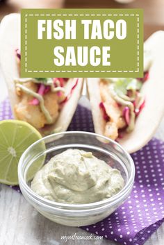 fish taco sauce in a glass bowl with lime wedges