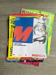 several magazines stacked on top of each other with the covers pulled back to reveal teeth