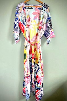 Colorful Printed Dress For Vacation, Colorful Printed Dresses For Vacation, Multicolor Summer Holiday Dresses, Multicolor Tropical Print Maxi Dress For Summer, Vibrant Print Patterned Dresses For Beach Season, Multicolor Maxi Dress For Spring Holiday, Beach Tropical Print Dress, Beach Dresses With Vibrant Print, Colorful Printed Beach Dress