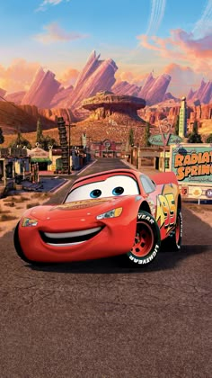 the character cars from disney pixars is driving down the road