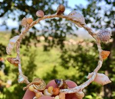 The Moana Poe✨En Forme d' idées® Bracelet and its little bag*✨ is a unique piece, made with Love  ❤️. This shell jewelry is connected to nature 💙 🐚 🌊 🌬  handmade: creation time: 8 hours. ✨ Little bag made in India This bracelet is made to order, inspired by the following model https://enformedidees.etsy.com/listing/1558575148 * It is a light pink and very light yellow natural fiber bracelet. The lightly colored natural fiber is washable, it is braided with golden thread and assembled with de Shell Crowns, Golden Thread, Etsy Bridesmaid Gifts, Braided Bracelet, Bridesmaid Bracelet, Shell Jewelry, Mother Of Pearl Buttons, Braided Bracelets, Bridesmaids Gifts