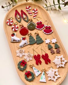 a wooden platter filled with christmas decorations