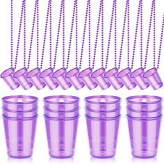 purple plastic cups with beads hanging from the top and bottom, all lined up in rows