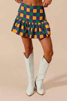 Mardi gras purple, green and gold checkered skirt with side, zipper and shorts lining .  Oversized fit  💜💚 💛THIS PREORDER SHIPS EARLY DECEMBER   📌  𝗧𝗛𝗘𝗥𝗘  𝗔𝗥𝗘  𝗡𝗢  𝗖𝗔𝗡𝗖𝗘𝗟𝗟𝗔𝗧𝗜𝗢𝗡𝗦   𝗢𝗡   𝗣𝗥𝗘𝗢𝗥𝗗𝗘𝗥  𝗜𝗧𝗘𝗠𝗦 ! 𝗪𝗲  𝗽𝘂𝗿𝗰𝗵𝗮𝘀𝗲  𝘁𝗵𝗲𝘀𝗲   𝗶𝘁𝗲m𝘀  𝗳𝗿𝗼𝗺  𝗼𝘂𝗿  𝗩𝗲𝗻𝗱𝗼𝗿  𝘄𝗵𝗲𝗻  𝘆𝗼𝘂𝗿   𝗼𝗿𝗱𝗲𝗿  𝗶𝘀   𝗽𝗹𝗮𝗰𝗲𝗱 . Mardi Gras Shorts, Checkered Skirt, Purple Green, Mardi Gras, Green And Gold, Oversized Fits, Side Zipper, Sparkle, Ships