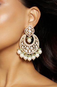 Royal Kundan Polki Chand Baali Earring - Joules By Radhika This designer chand baali earring is handcrafted with multi shaped polkis with baroque pearls & green agates. Ideal to be worn on festive, wedding & party occassions on your Indian & fusion attire.Every artistic piece from Joules by Radhika is made with real semi precious stones only, giving it a regal look & feel. SET INCLUDES: Earrings Details: Handcrafted with ❤️ Metal: Brass Product Type: Earrings Stone: Hydro Polkis, Baroque Pearls, Karnphool Earrings, Green Fusion Style Chandbalis With Cutdana, Green Cutdana Chandbalis In Fusion Style, Green Cutdana Fusion Chandbalis, Festive Hand Set Chandbali Pearl Earrings, Festive Hand Set Pearl Chandbali Earrings, Festive Hand-set Pearl Chandbali Earrings, Festive Handcrafted Chandbali Pearl Earrings, Fusion Kundan Jhumkas With Pearl Drop