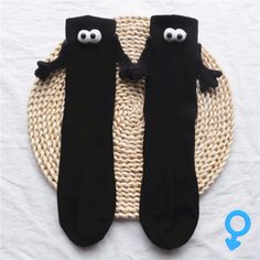 Overview: 1. Couple Design: These socks are designed for couples, with a matching black and white design that symbolizes unity. 2. Fashionable: The socks feature a trendy mid-calf length design that complements any outfit. 3. Magnetic Connection: The socks are equipped with a magnetic connection, which allows couples to hold hands even when wearing shoes. 4. Unique 3D Design: The socks feature a unique design that adds a playful to your outfit. 5. Comfortable Material: The socks are made of high Hand In Hand Couple, Hand Couple, Couple Socks, Hand Socks, Couple Holding Hands, Unique Socks, Black And White Cartoon, Cartoon Eyes, Comfortable Socks