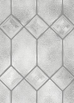 an image of a glass tile pattern that looks like hexagonals in silver