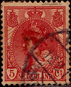 an old red and black stamp with the image of a woman in a crown on it