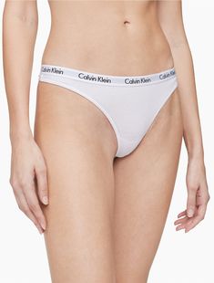 Classic and essential, this Calvin Klein thong is crafted from extra soft cotton stretch for flexible comfort. Designed with a signature repeating logo elastic waistband, minimal rear coverage, and a high leg silhouette.  Material: 90% Cotton, 10% Elastane. Calvin Klein Thong, Calvin Klein Women, High Leg, Carousel, Calvin Klein, Autumn Fashion, Elastic, ? Logo