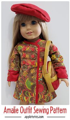 the doll is wearing a brown dress and red hat with flowers on it's head