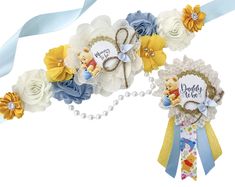 two ribbons with winnie the pooh decorations attached to each one's headband