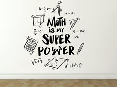 a wall decal with the words math is my super power written in black ink