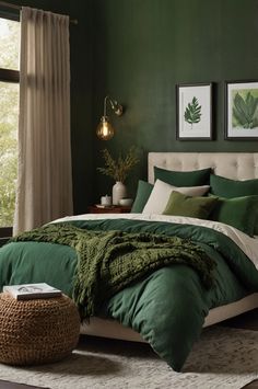 a bed with green sheets and pillows in a room next to a window, rugs and pictures on the wall