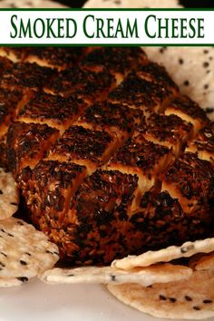 A brick of homemade smoked cheese, surrounded by crackers. Smoked Cream Cheese Recipe, Charcoal Grill Recipes, Cream Cheese Recipe, Cheese Dip Recipes, Cream Cheese Dips, Cheese Ball Recipes