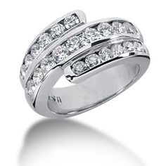 a white gold ring with three rows of diamonds