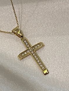 "ABOUT PRODUCT This 14K Solid Gold Cross with CZ Diamond necklace is beautifully designed and hand crafted with our associates to make this a special gift for your loved ones. Knowing the value of our customers, We prepare each piece with extra care and attention.  ITEM DETAILS Material: 14K Gold Approx:  2,2 gram with the chain. Only Pendant is 1,2 grams. Available colors: Gold, Rose Gold, White Gold Available Sizes: 14\" to 20\" ✪ 14k Solid Gold ( Certification will be included with your order Dazzling Hand-set Pendant Necklace, Diamond Pendant Necklace Hallmarked, Gold Pendant Jewelry With Pave Setting, Luxury Diamond Cross Pendant Necklace For Formal Occasions, Gold Jewelry Pendant With Pave Setting, Exquisite Gold Necklace With Pave Setting, Formal Cross Necklace In Cubic Zirconia, Formal Cross Necklace With Cubic Zirconia, Cubic Zirconia Brilliant Cut Cross Pendant Necklace