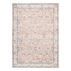 an antique style rug in peach and grey tones