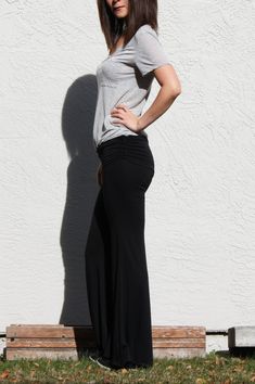 "Comfy and easy black wide leg pants you can wear more than lounging and exercise Fold over waist with side draw strings Fitted over knees and flares beautifully at the bottom Wear it around town for easy walk or shopping at farmers market -Fits like glove -Wide bottom -Double layered waist panel goes under the chest. It can be worn as a maternity pants in this way. -Draw Strings attached on both waist sides to create shirring when they are pulled -Waist sits below naval when the double layered Black Flared Trousers, Black Palazzo Pants, San Ramon, Black Wide Leg Pants, Custom Made Clothing, Boho Pants, Black Flare, Maternity Pants, Bell Bottom Pants