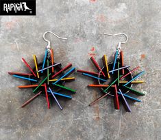 "Beautiful and colorful hand-painted earrings by artists from Guadalajara, Mexico. Inspired by the cover of Depeche Mode's album \"Sounds of the Universe\".  with the music of the band Pink Floyd. The earrings are made with 3 layers of wood to give a 3D effect. Includes 1 pair of hand-painted earrings, a certificate-card with the original signature of the artist who painted them (each piece is also signed on the back)  :) Specifications, measurements and shipping: Measurement: 1.18 in long X 1.77 in wide approximately. - STAINLESS STEEL. (Hook and ring) - MDF wood painted with acrylic paints and high protection varnish. -Treat with care as they are small pieces of art hand painted detail by detail, do not expose them to water or vapors. -Hand painted earrings made in Guadalajara, Mexico :) Artistic Multicolor Earrings With Colorful Design, Artistic Multicolor Earrings, Funky Multicolor Hand Painted Jewelry, Artistic Colorful Earrings, Depeche Mode Albums, Sounds Of The Universe, Rock Accessories, Mode Rock, Hand Painted Earrings