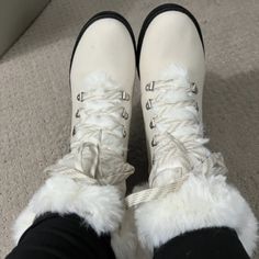 Never Been Worn These Boots Are Amazing. They Are Super Warm And Comfy You Can Tie Them Or Leave Them Open To Show Fur On The Inside. These Boots Are The Perfect Height For Going To A Club Or Taking A Hike. Trendy White Winter Booties, Cream Synthetic Boots For Winter, White Synthetic Casual Booties, White Round Toe Winter Booties, White Casual Synthetic Booties, Casual White Synthetic Booties, Winter Cream Synthetic Boots, White Ankle-high Winter Booties, Cream Synthetic Winter Boots