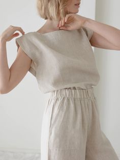 Our iconic Everyday Top is handcrafted from luxurious certified organic linen in new, Natural linen. This easy, minimalist top features a wide neckline, slightly boxy body, and mid-to-cropped length, perfect for tucking into our Everyday Crop Pant or wearing with your favorite jeans. We appreciate the natural beauty of Monochromatic Minimalist, Minimalist Top, Family Separation, Portrait Photography Women, Organic Linens, Photography Women, Natural Linen, Favorite Jeans, Cropped Pants