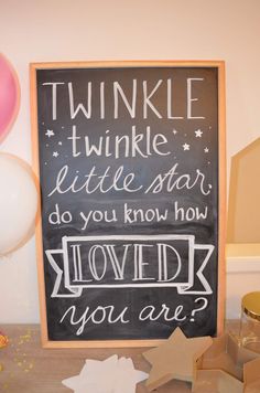 a chalkboard sign that reads twinkle twinkle little star do you know how loved you are