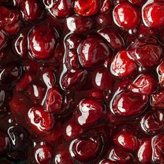 closeup of cherries that have been cooked and are very dark red in color