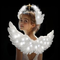 PRICES MAY VARY. Premium Feathers: These angel wings and halo headband are crafted from soft, white feathers for a comfortable feel. Fully handcrafted with a sturdy structure, they resist fading and deformation. The plump, lightweight feathers won't fall off, ensuring you achieve the best angelic or mother of Mary look. Three Lighting Modes: Our angel costumes for girls feature three lighting modes: fast flash, slow flash, and steady on. Choose the mode that best fits your needs to look cute, li Angel Halo Diy, Girls Angel Costume, Cupid Wings, Feather Fairy, Angel Wings And Halo, Angel Costumes, Angel Wings Halo, Wings And Halo, Angel Halo