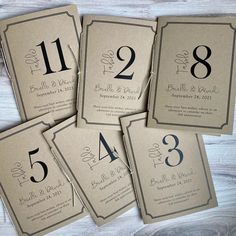 six wedding cards with numbers on them